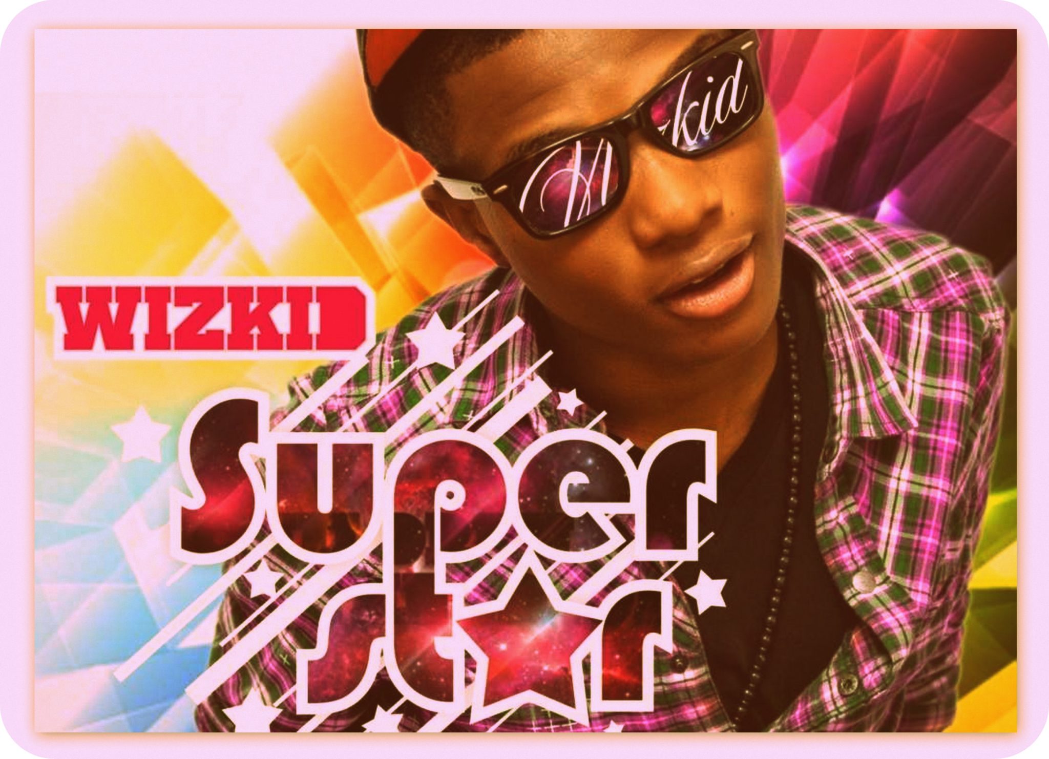 Afrobeats superstar Wizkid celebrating the 10th anniversary of his debut album 'Superstar'