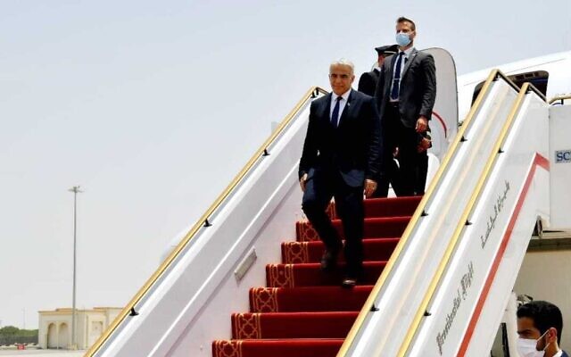 Ahmed Ali Al Sayegh (R) welcomes Israeli foreign minister Yair Lapid at Abu Dhabi Airport, UAE