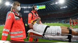 Italy defender Leonardo Spinazzola was stretchered off with an Achilles tendon injury in Munich Creator: Matthias Hangst