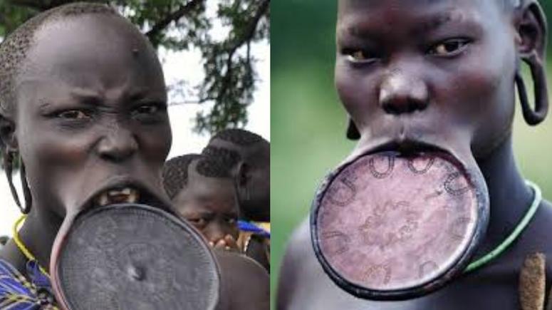 The Mursi people of Ethiopia wear having lip plates in their mouths