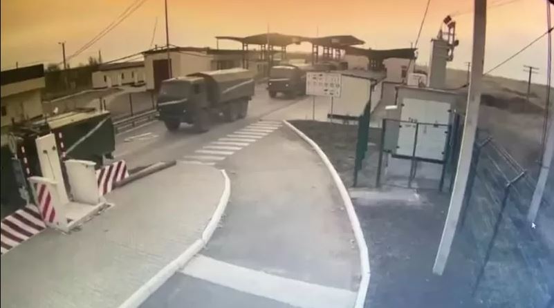 This picture obtained from CCTV has been released by the State Border Guard Service of Ukraine. The military vehicles seen in this are said to be of the Russian army which is entering Ukraine from Crimea.