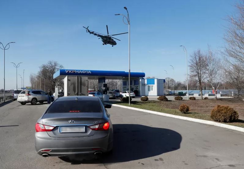A Ukrainian military helicopter flew over a fuel station outside the city of Dnipro.