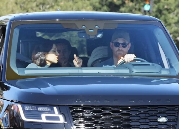 Prince Harry and Meghan Markle spotted driving to visit Oprah Winfrey