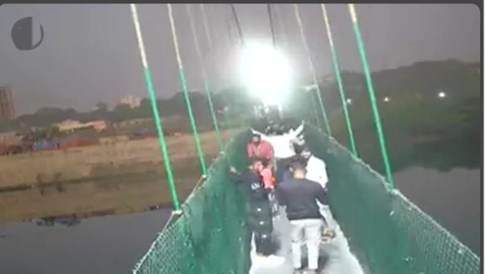 Video shows person shaking India bridge moments before collapse, killing 141