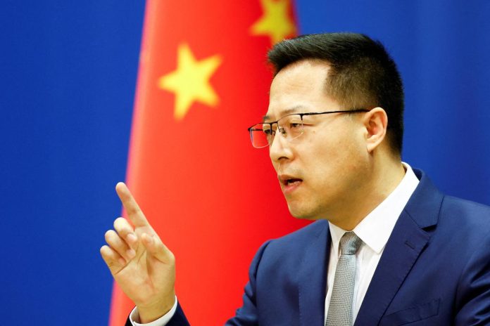 China threatened a forceful response as it accused UK lawmakers of 