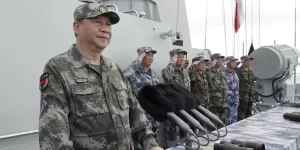 China boosts military budget, warns of escalating threats