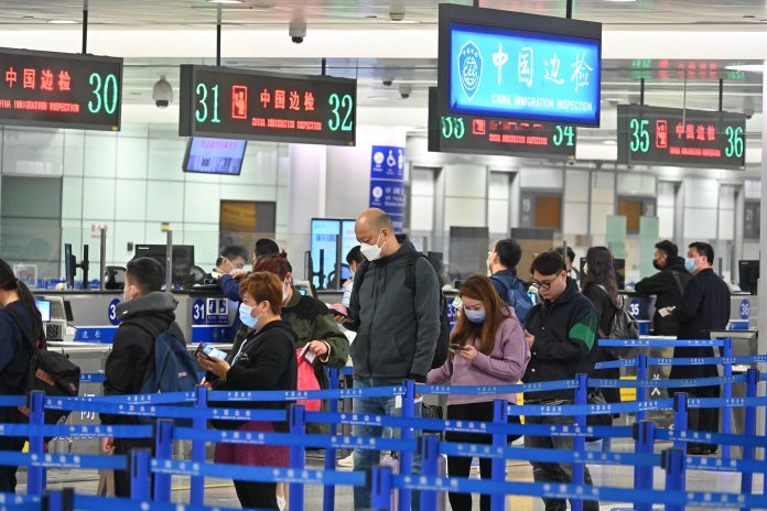 China reopens borders to all travelers