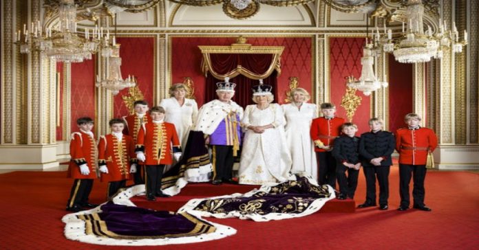 King Charles marks his coronation with a photograph of himself with his heirs