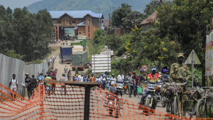 Militants kill 42 in an attack on a school in western Uganda