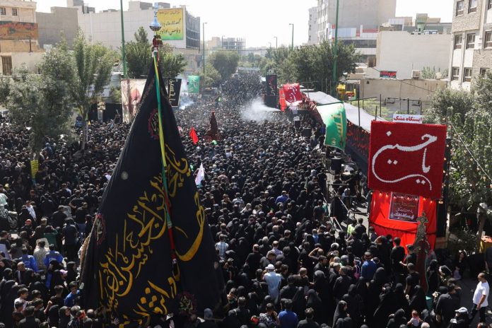 How many global records does the great Arbaeen Walk hold