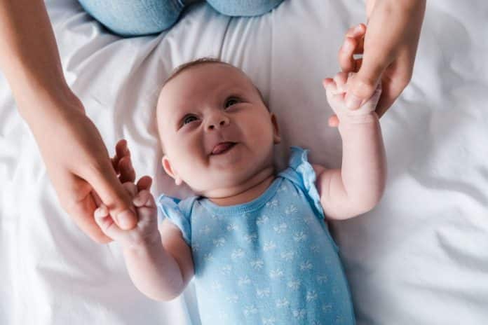 Reasons your baby's fingers smell bad & how to fix them