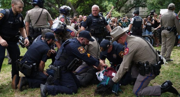 US university protest, students arrested, US claim of democracy.